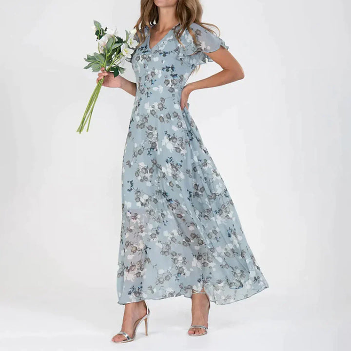 Elegante Hoymans dames vintage maxi-jurk met levendige bloemenprint en V-hals, perfect als zomerjurk.