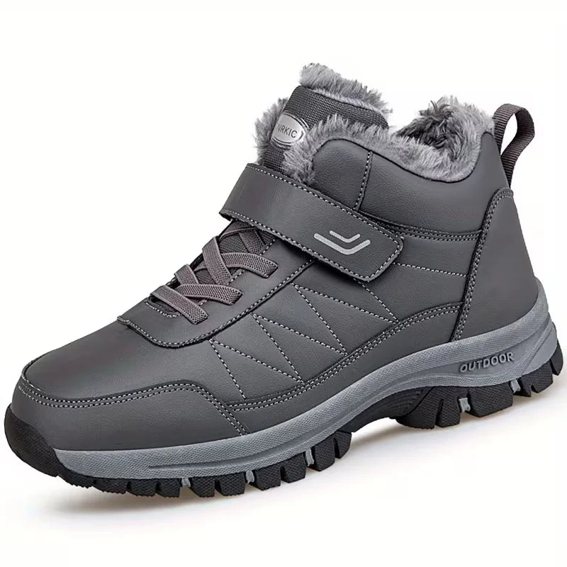 Grijze Chloe dames winterschoenen: geïsoleerde, antislip outdoor enkellaars voor warmte en comfort tijdens koude dagen.