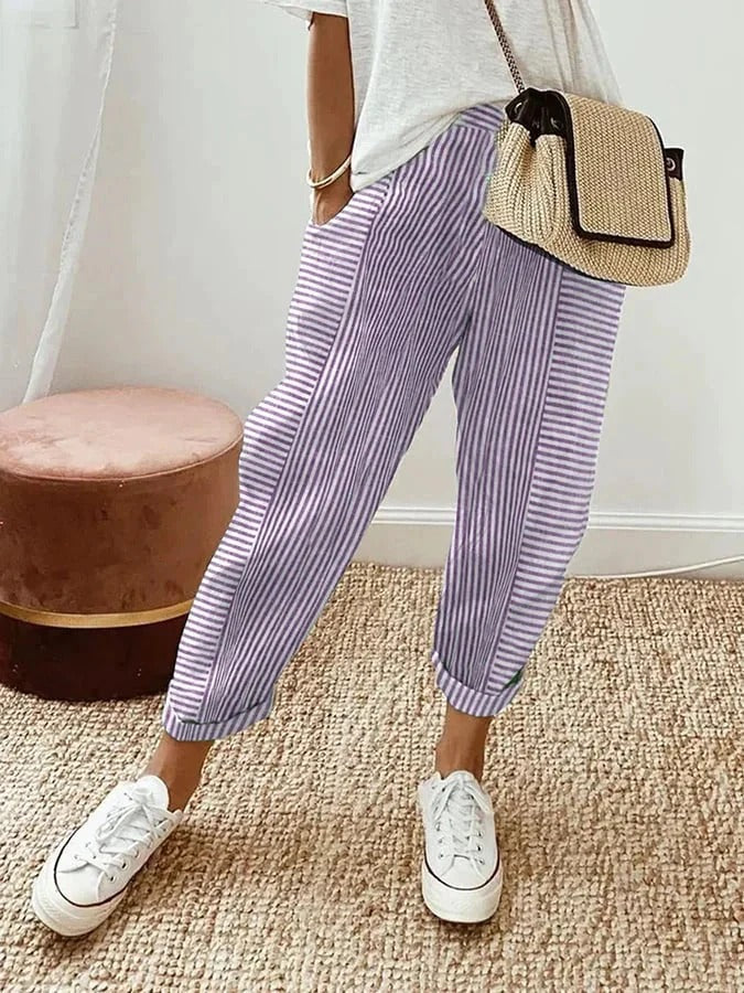 Luchtige gestreepte dames zomerbroek met hoge taille en trekkoord. Ideaal voor warme dagen, trendy en comfortabel.