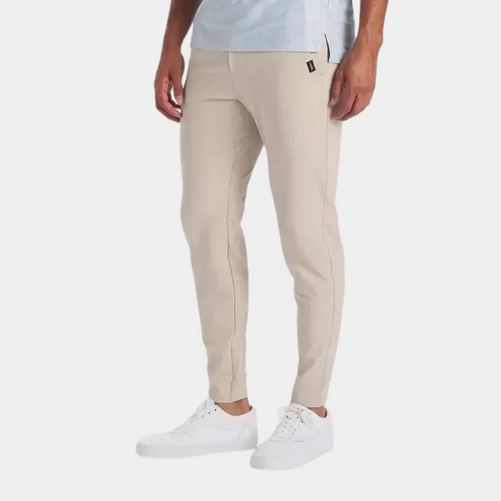 Robuuste winddichte en waterafstotende herenbroek. Een veelzijdige stretchbroek voor buitenkleding.