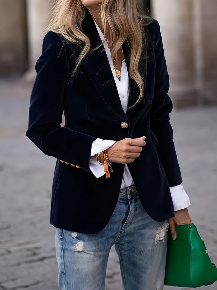 Stijlvolle donkergele dames blazer, elegant getailleerd, met enkele knoop. Perfect voor een moderne look.