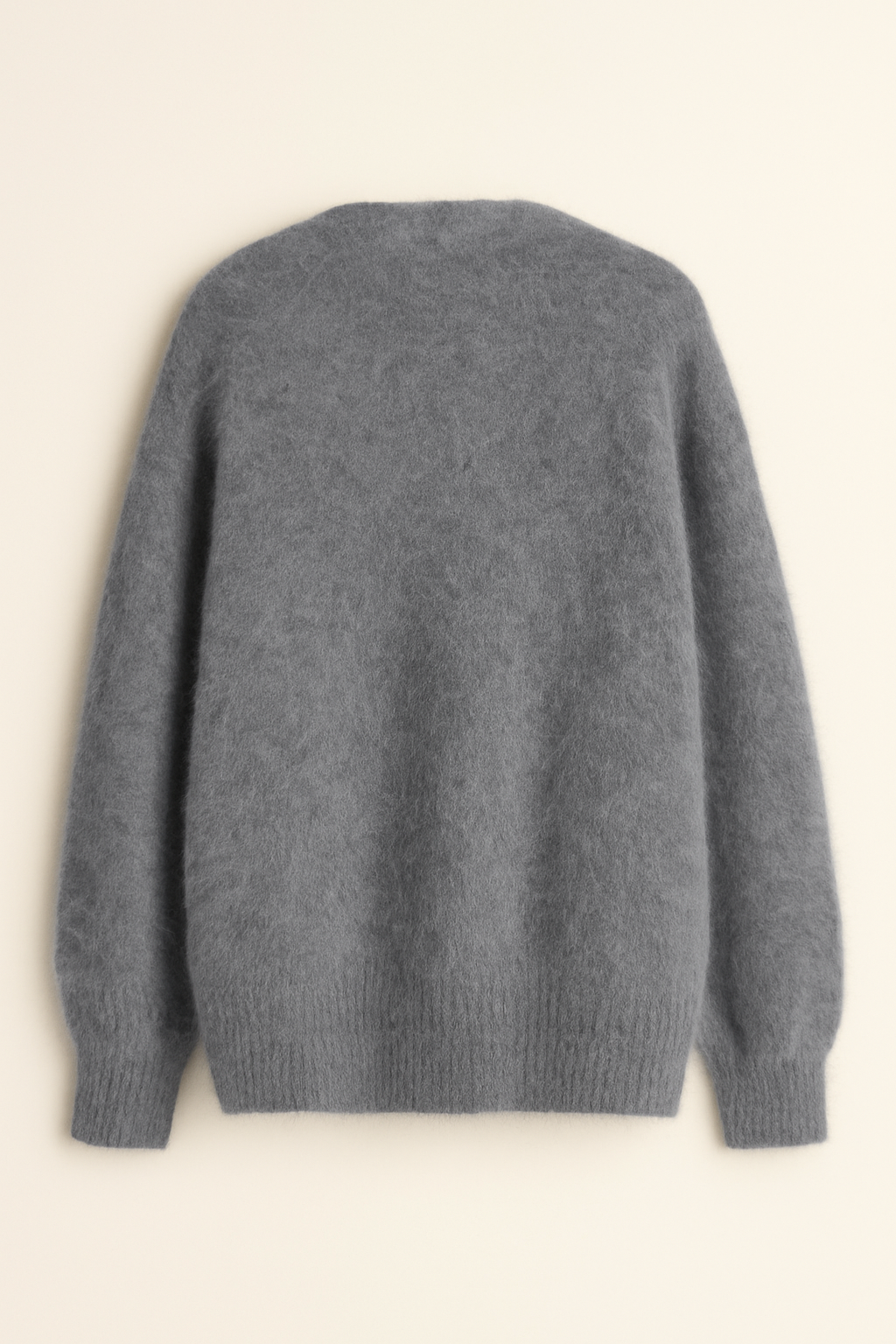 Zacht gebreid dames vest met elegante afwerking. Een must-have voor herfstmode en comfort.