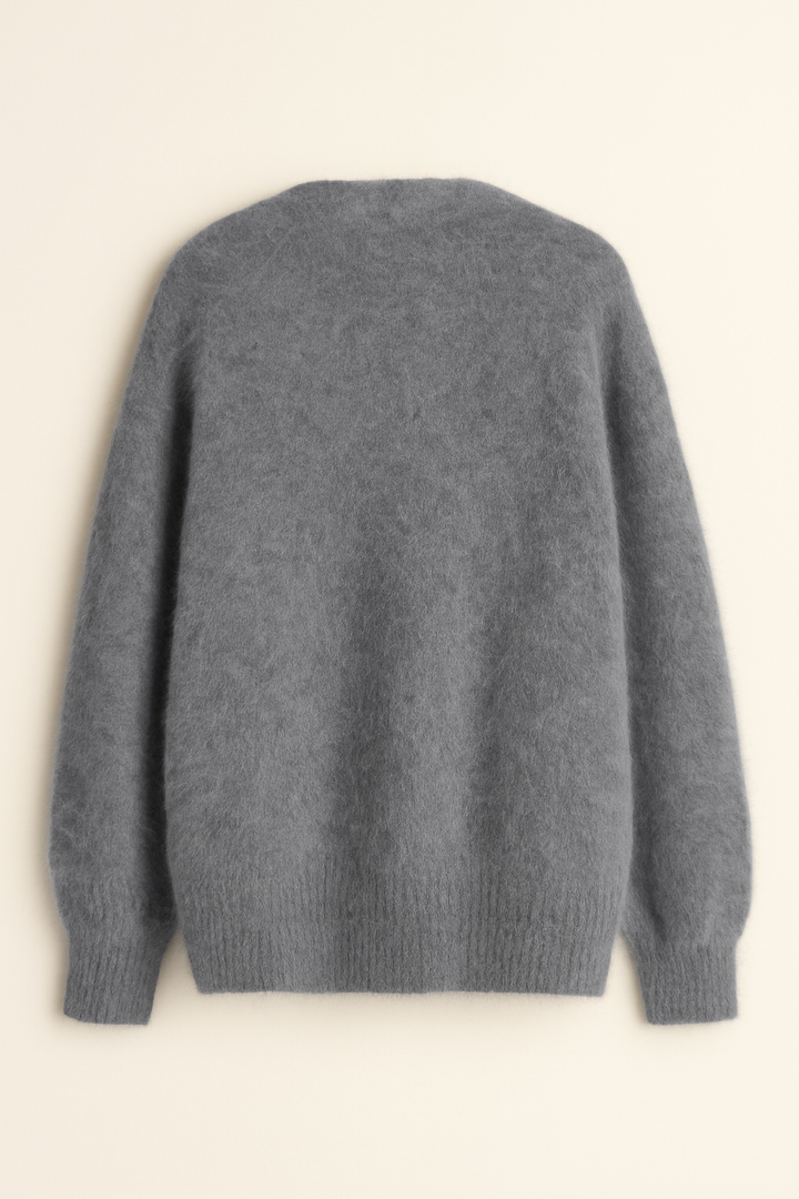 Zacht gebreid dames vest met elegante afwerking. Een must-have voor herfstmode en comfort.