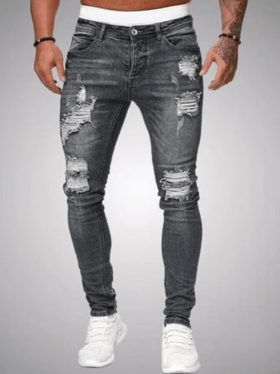 Comfortabele slim fit heren jeans met stoere scheuren, perfecte spijkerbroek voor een eigentijdse look.