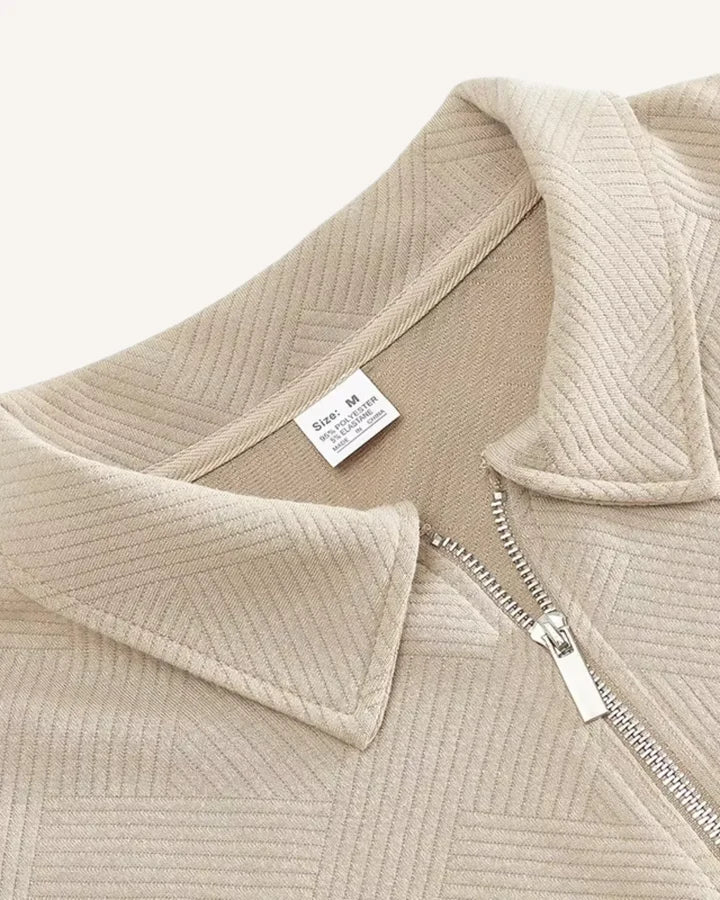 Heren pullover met polokraag en halve ritssluiting; kwaliteit en modern design.