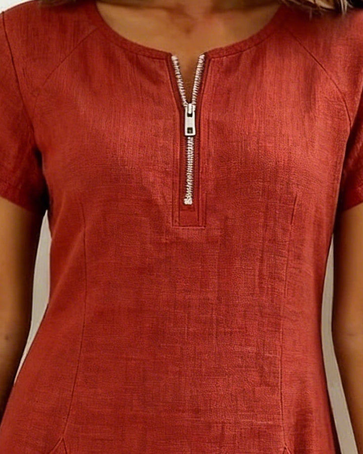Comfortabele A-lijn jurk voor dames met ritssluiting en korte mouw. Ideale casual jurk met zakken voor warm weer.