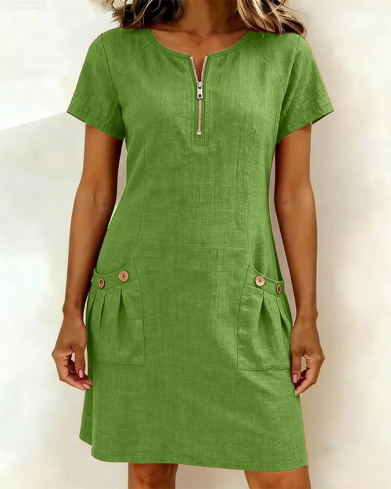 Flatterende A-lijn jurk dames, met elegante ritssluiting en korte mouw. Biedt comfort en stijl voor elke gelegenheid.