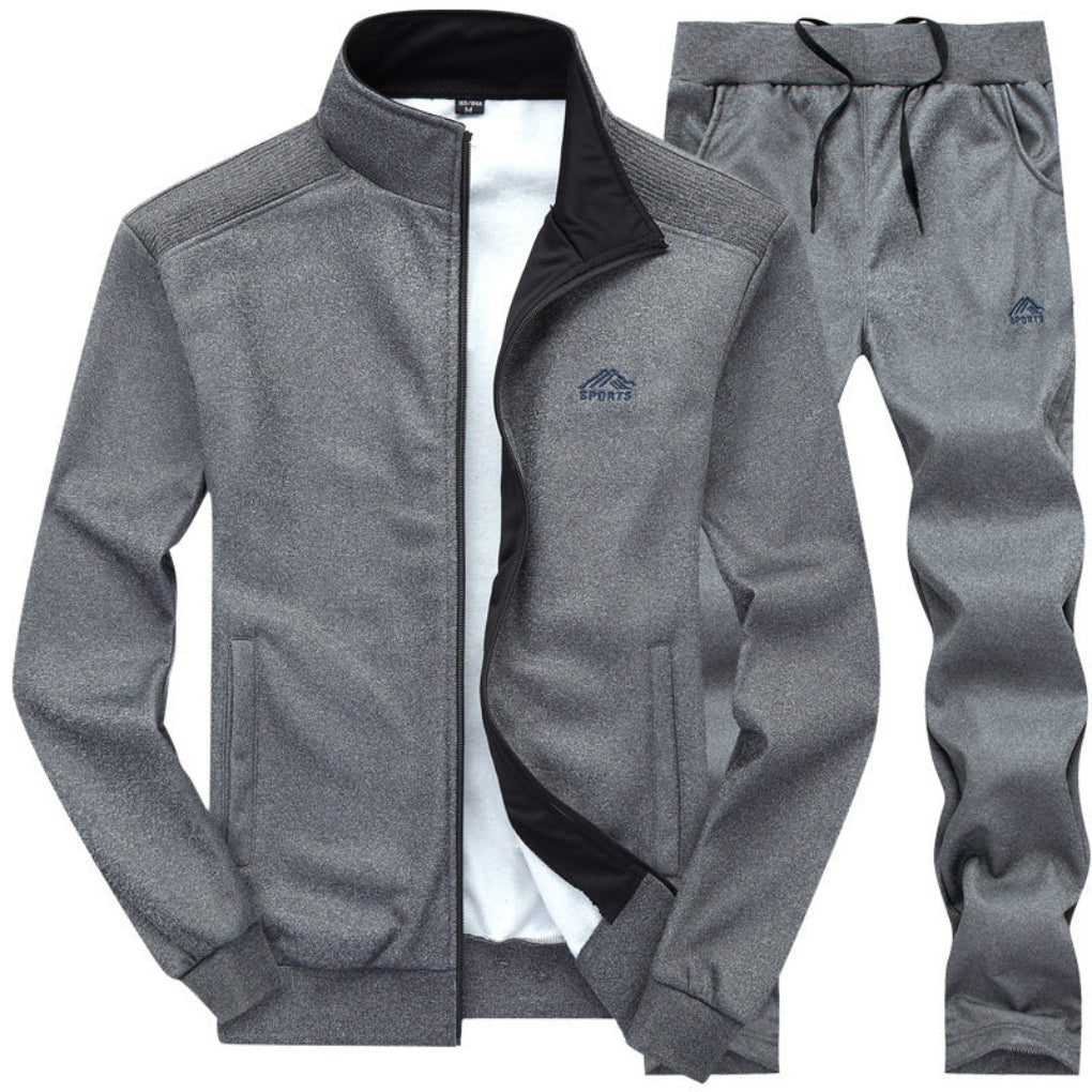 Comfortabel heren trainingspak in grijs-zwart, ideaal als veelzijdige athleisure outfit voor een sportieve look.