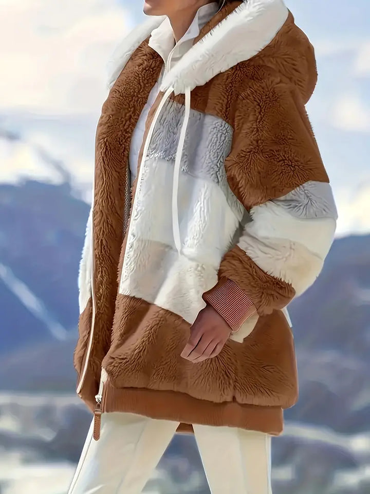 Robuuste groene Layla outdoor jas met capuchon, mid-lengte en warme winterjas voor dames.
