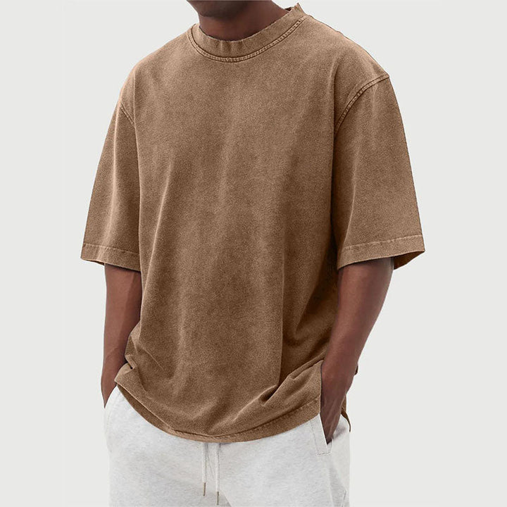Effen heren t-shirt met korte mouw en relaxte pasvorm, een tijdloze toevoeging aan elke herenkleding collectie.