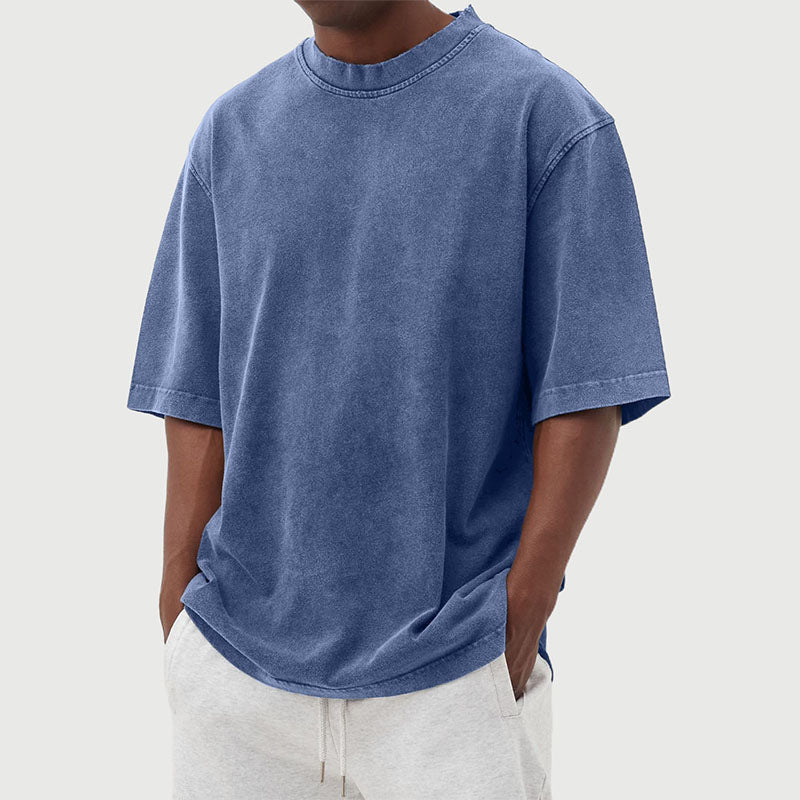 Heren t-shirt met relaxte pasvorm en unieke gewassen look, perfect voor casual lente/zomer stijl.