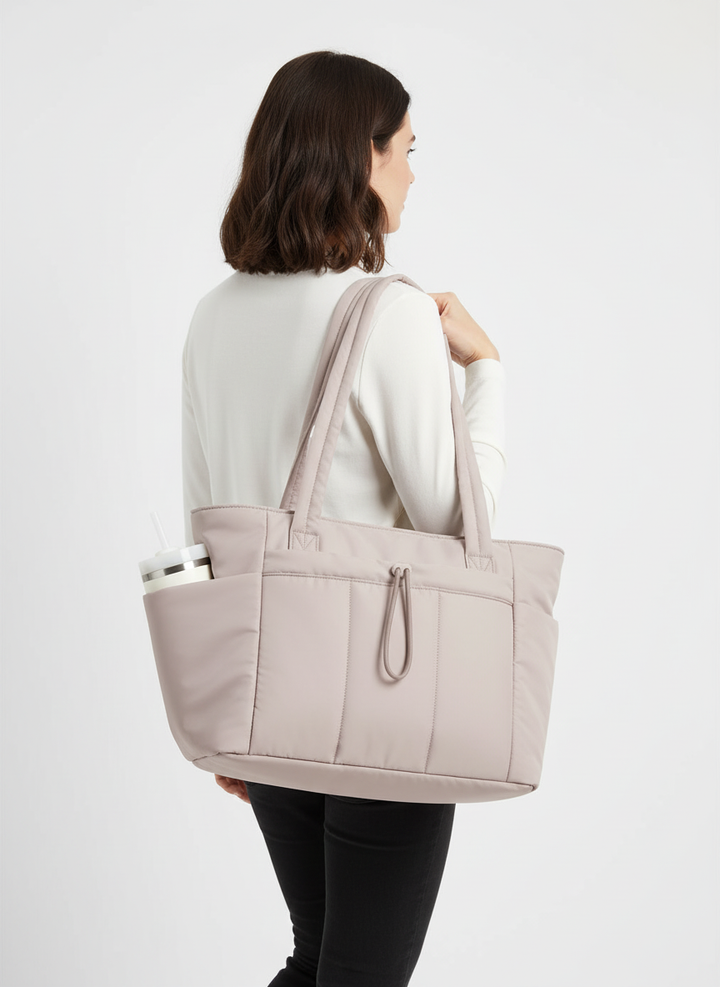 Ruime reistas voor dames: waterdicht nylon, inclusief laptopbescherming en bekervak voor georganiseerd onderweg.