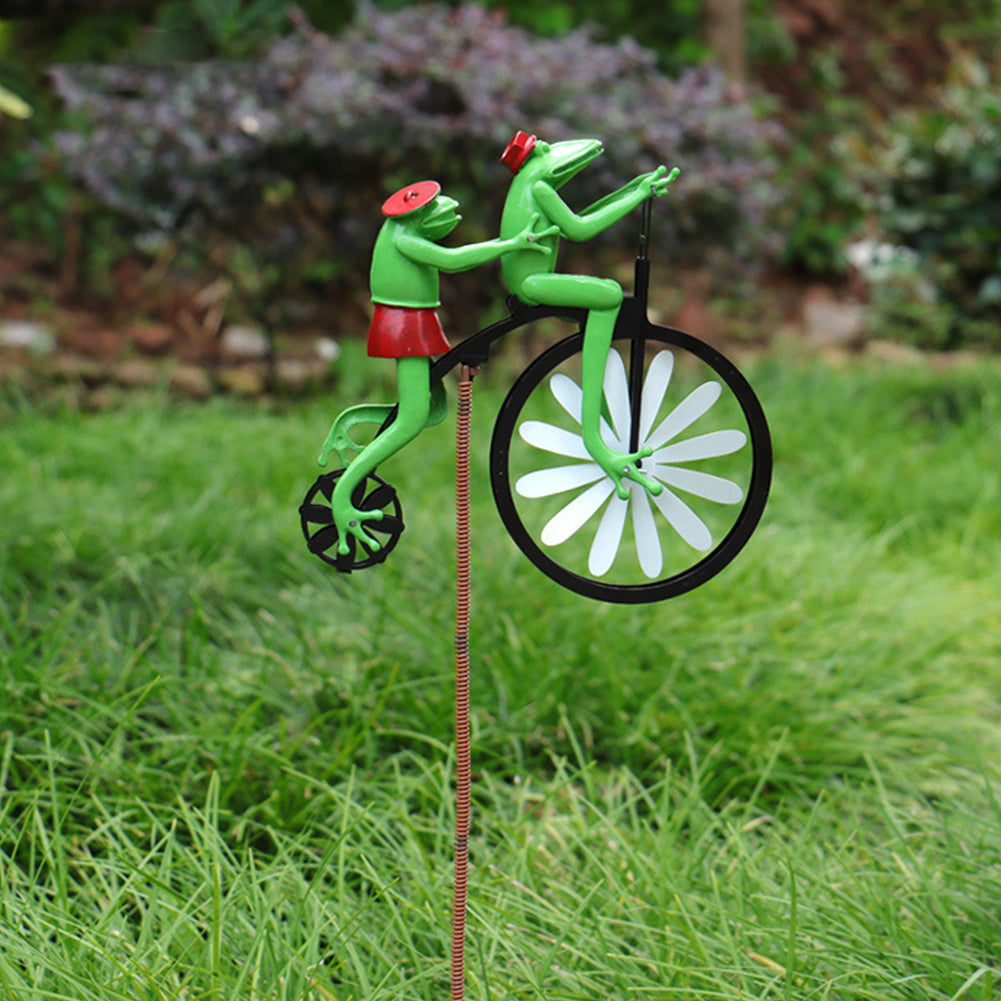 Vrolijk windmolentje tuindecoratie: speels fietsend dier, ideaal tuinornament of buitendecoratie voor elke tuin.