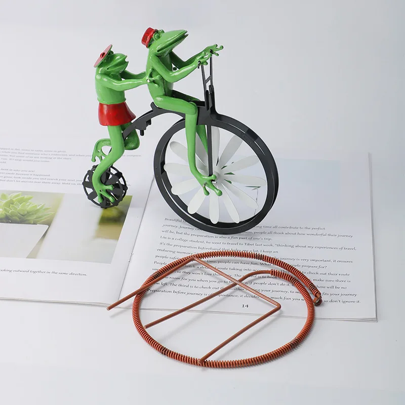 Roestvrijstalen windmolen tuinsteker met fietsend dier, duurzame tuindecoratie voor langdurig plezier in de tuin.