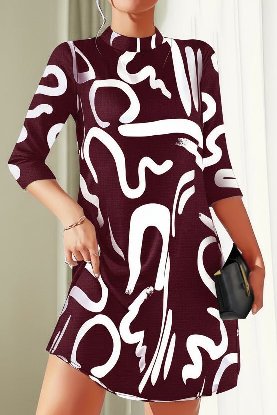 Stijlvolle dames patroonjurk met losse pasvorm, driekwartmouw. Trendy en comfortabel voor een casual look.