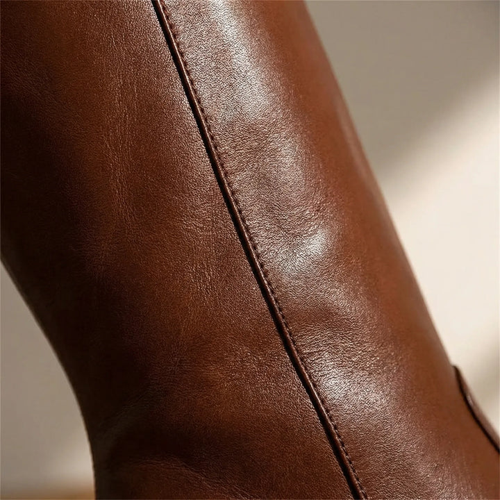 Comfortabele bruine dameslaarzen: kniehoog model met elegante blokhak, ideaal voor dagelijks gebruik.