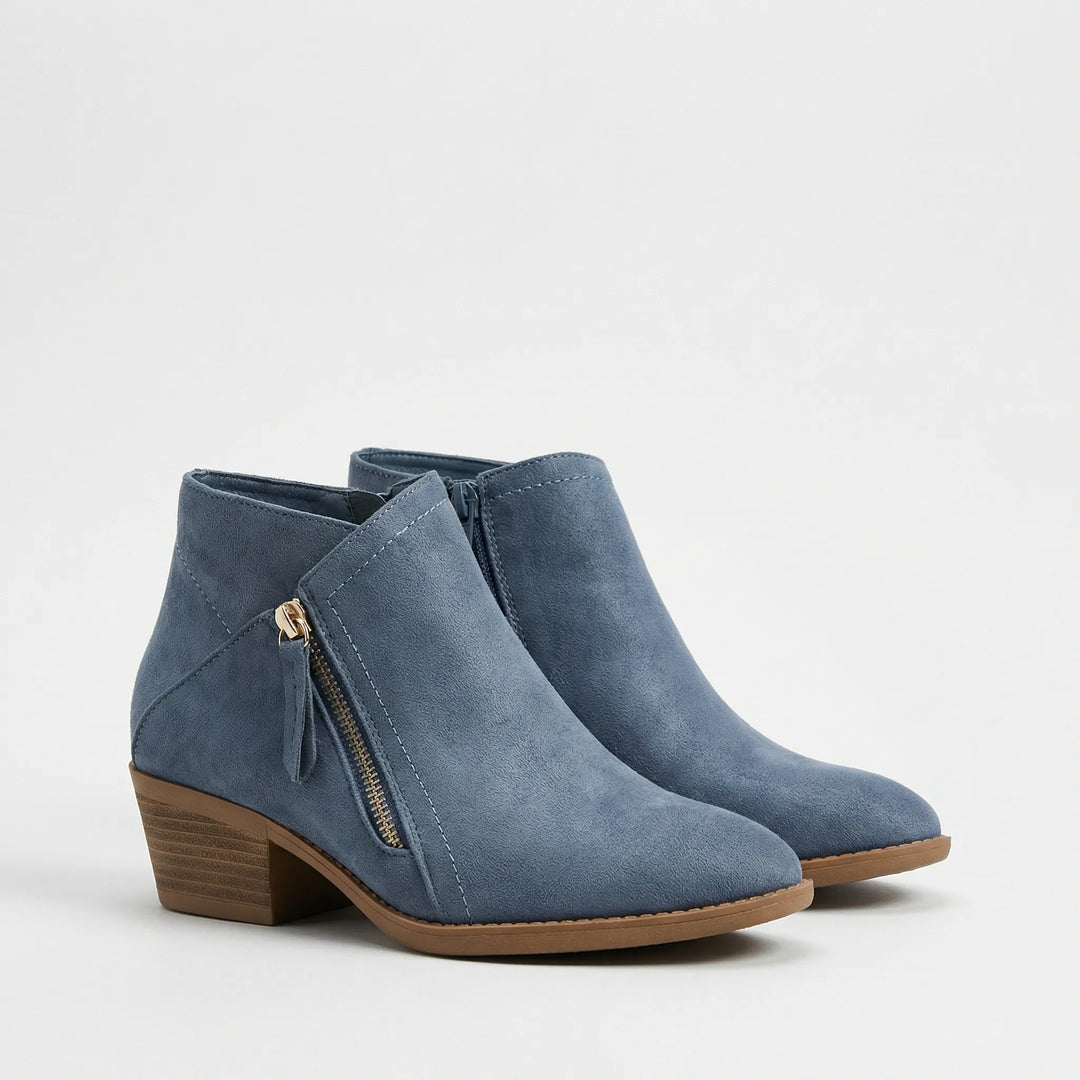 Modieuze Freya dames enkellaarsjes met stevige blokhak en ritssluiting, comfortabel en elegant voor wintermode.