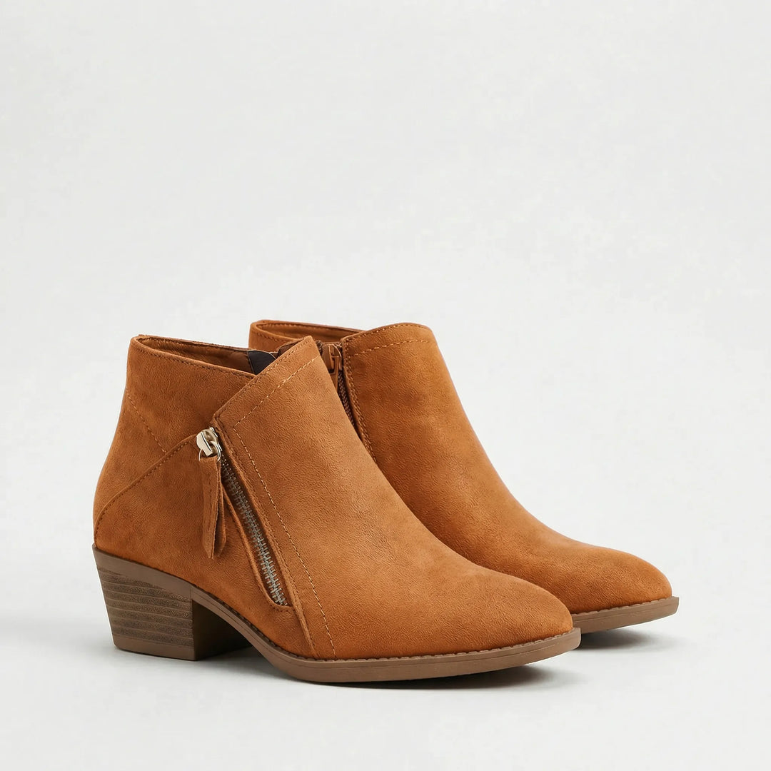 Dames enkellaarsje Freya met medium hak en ritssluiting, combineert mode en draagcomfort voor een stijlvolle herfstlook.