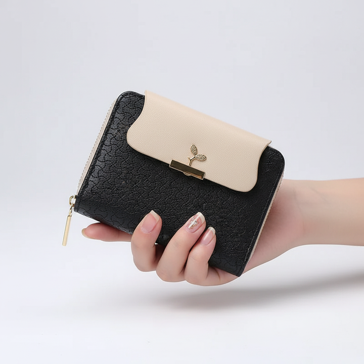 Elegante compacte dames portemonnee, een stijlvol en essentieel accessoire met rits.