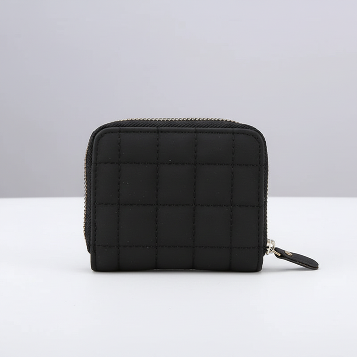 Praktische compacte leren portemonnee voor dames, combineert elegantie met functionaliteit.
