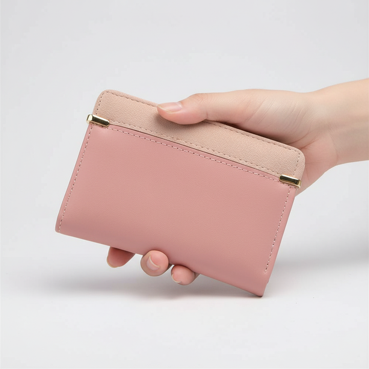 Kleine dames portemonnee van duurzaam PU-leer, geschikt voor pasjes en briefgeld.