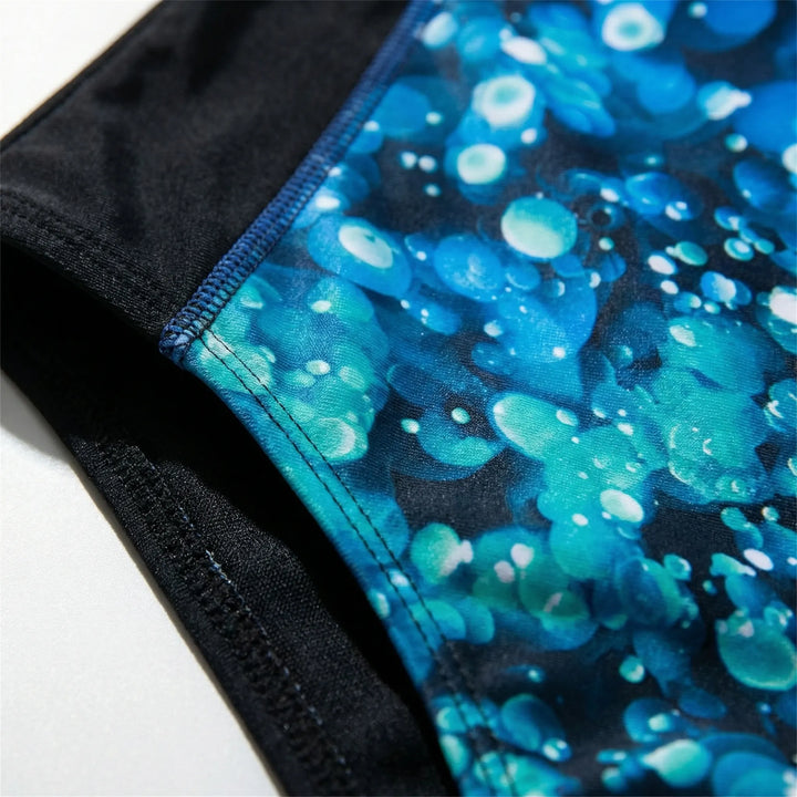 Modern corrigerend dames badpak, stijlvolle zwemkleding voor een flatterende pasvorm.