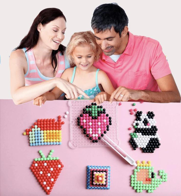 Detail van de DiamondPen: kinderen plaatsen kleurrijke kralen in unieke kunstwerken; stimuleert handwerk.
