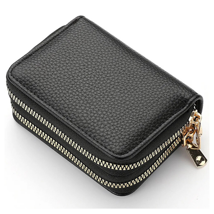 Compacte dames portemonnee in de hand, toont het ideale formaat en praktische design. Geschikt voor elke tas.