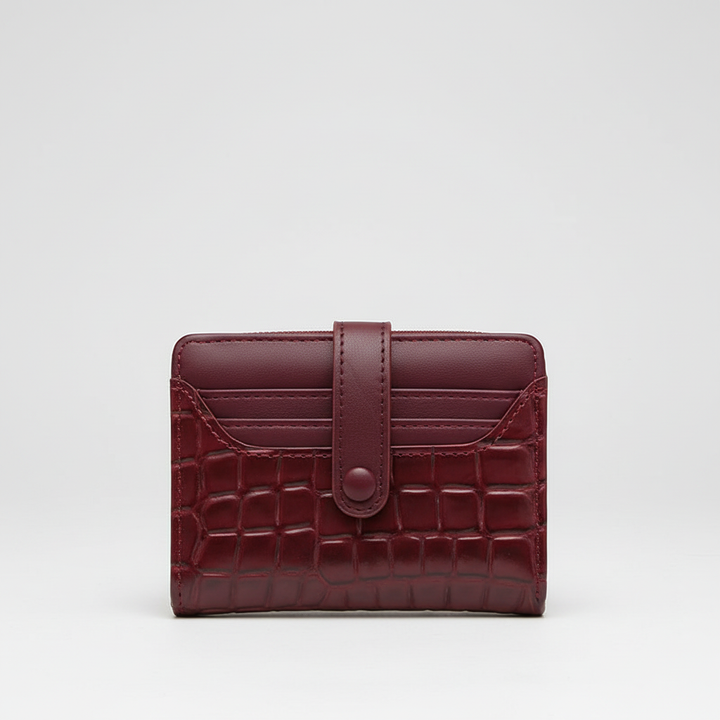 Duurzame PVC compacte damesportemonnee, versierd met elegante pailletten en drukknoopsluiting.