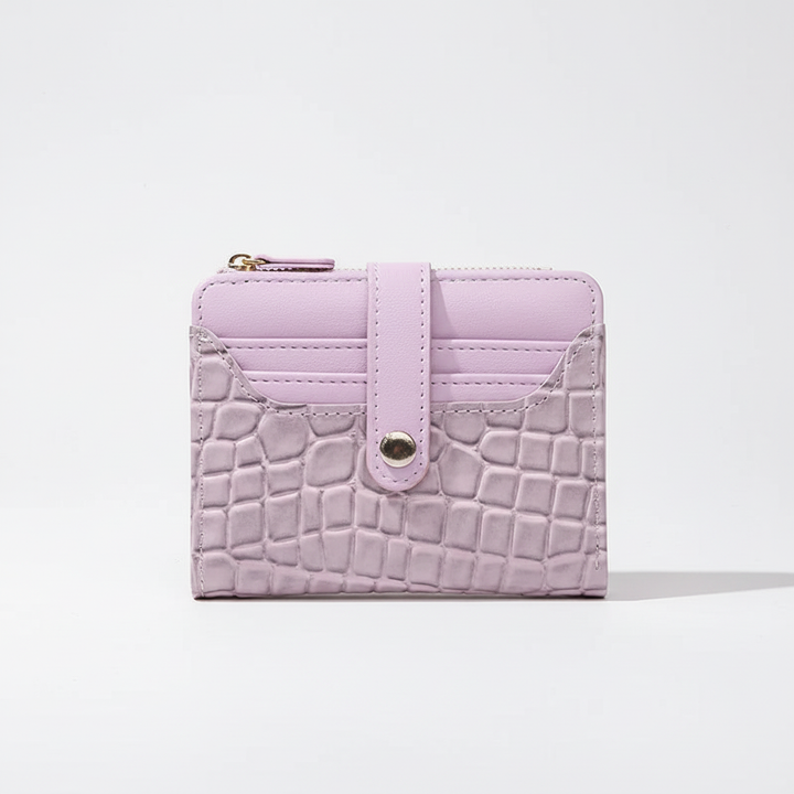 Perfect cadeau voor vrouwen: compacte damesportemonnee met glinsterende pailletten en drukknoop.