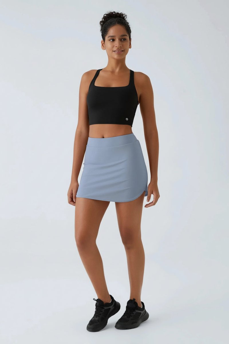 Dames micro lengte athletic skort in ivy groen, ideaal voor sport en actieve dagen.