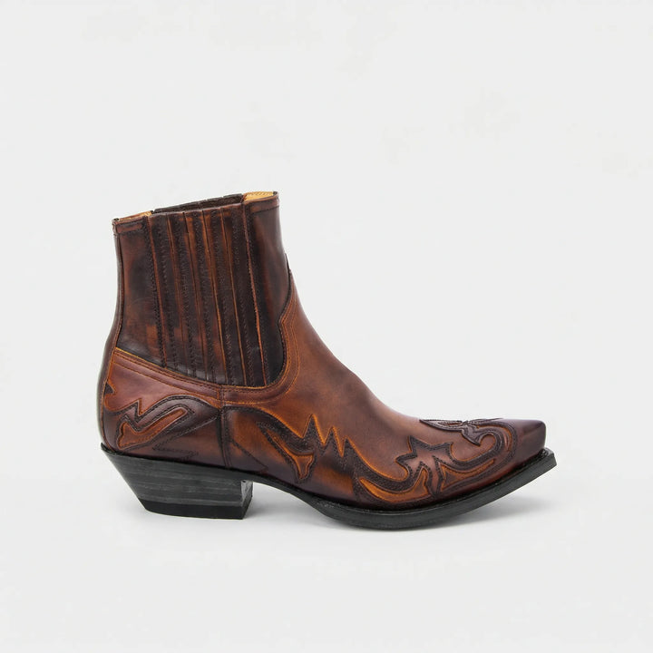 Dames westernlaarzen met korte schacht in klassieke stijl. Comfortabele pasvorm, perfect voor elke gelegenheid.