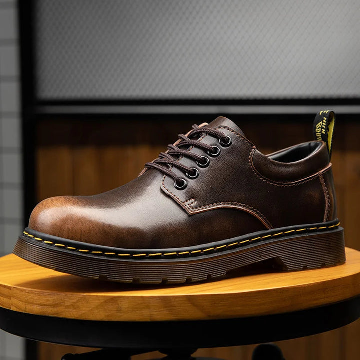 Elegante bruine heren oxford veterlaarzen. Tijdloos design en comfortabele pasvorm voor de moderne man.