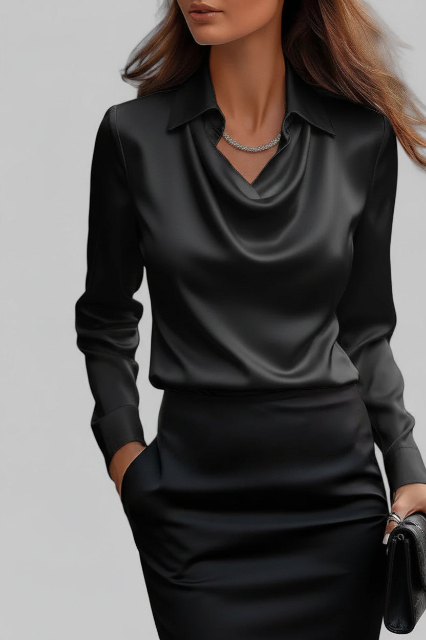 Elegante gedrapeerde damesblouse met lange mouwen, perfect voor avondmode of een chique diner.
