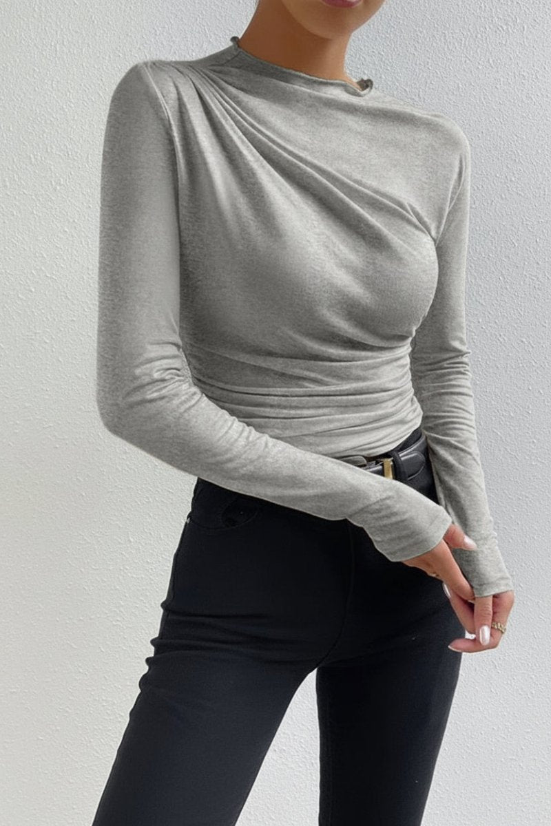 Comfortabele dames longsleeve met verfijnde plooidetails. Ideaal geplooid shirt voor dagelijkse mode en laagjes.