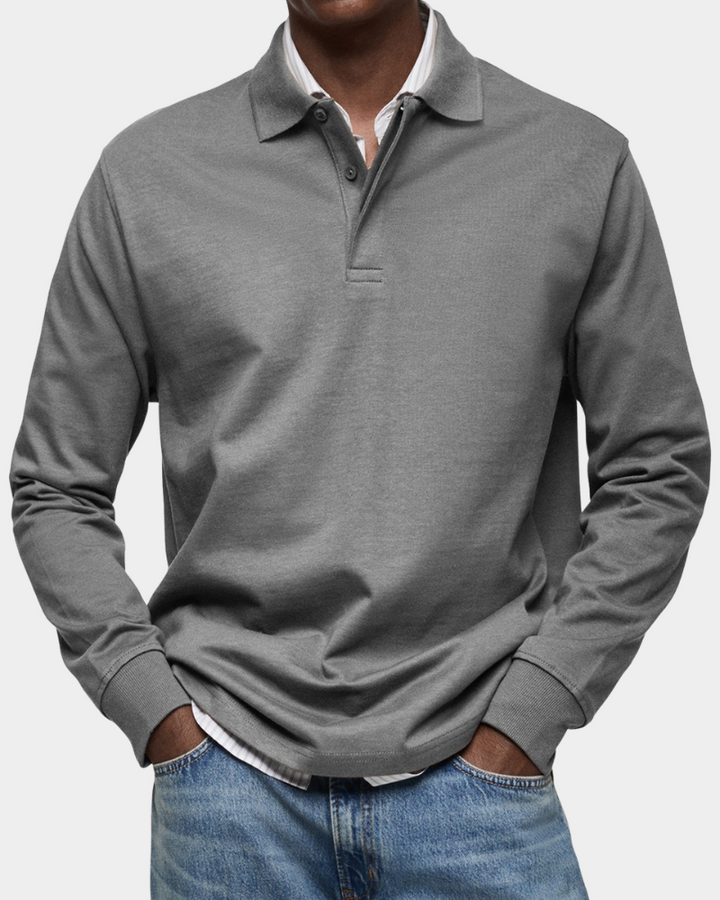 Casual heren poloshirt met lange mouwen, essentiële en comfortabele aanvulling op elke garderobe.
