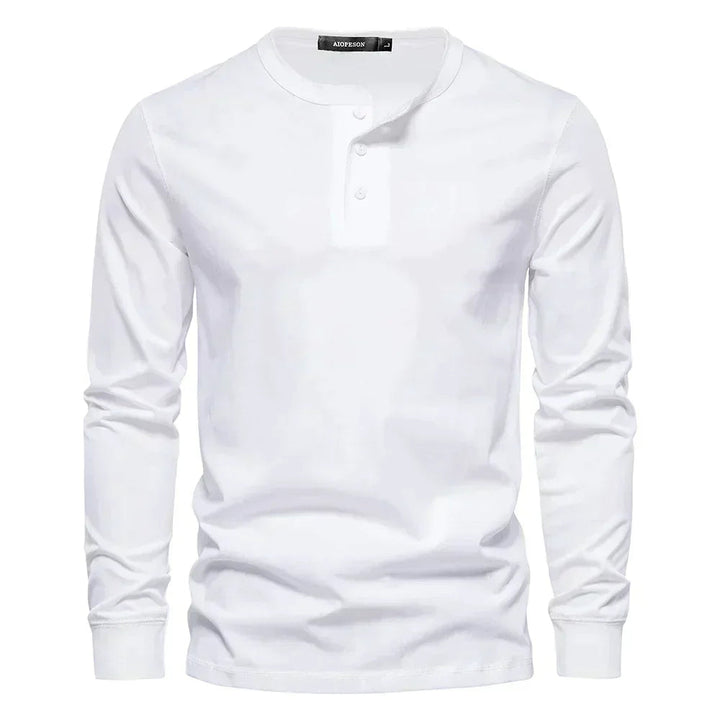 Comfortabel heren Henley shirt met lange mouwen. Zacht en ademend, ideaal voor de warmere dagen in de lente/zomer.