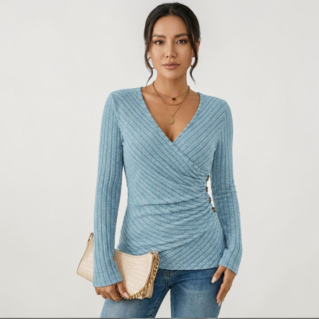 Elegante dames overslagtop met V-hals en lange mouwen, perfect voor een casual chic of zakelijke look.