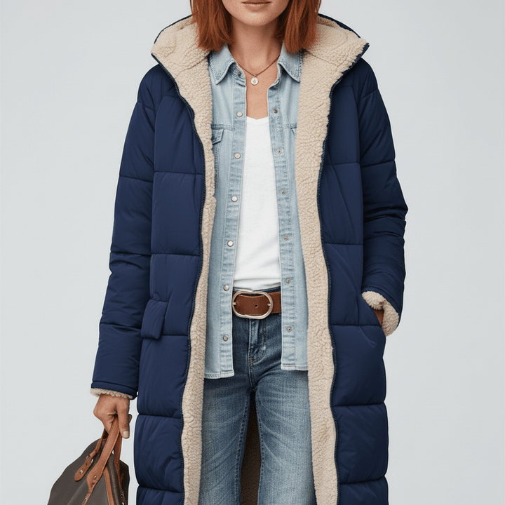 Dames lange puffer jas, comfortabel en warm. Doorgestikte buitenkleding ideaal voor de koude wintermaanden.
