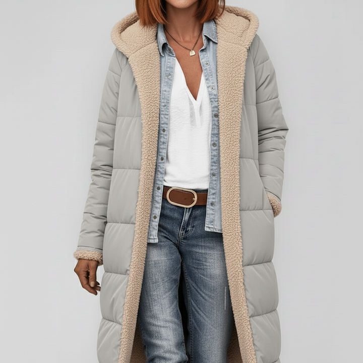 Warme en stijlvolle longline winterjas dames, gewatteerde mantel die mode en functionaliteit biedt.