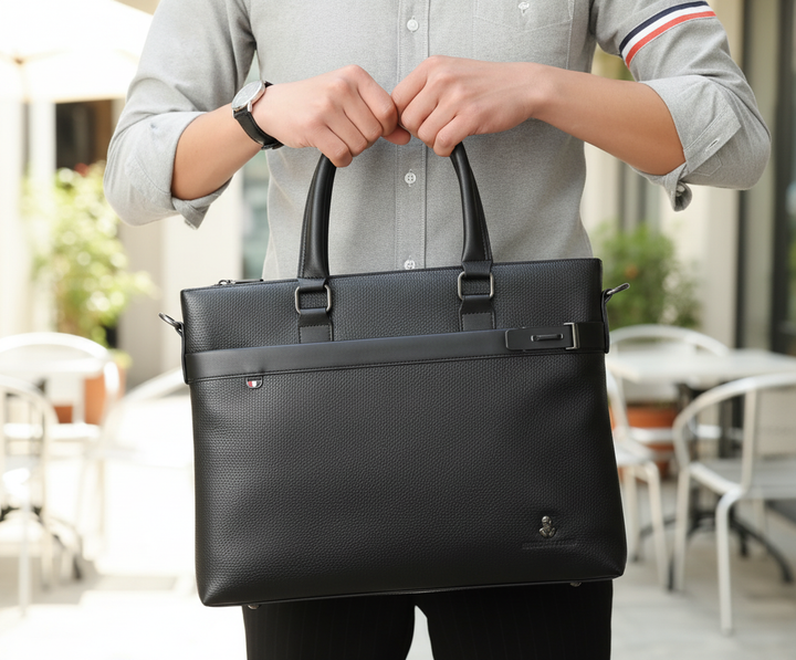 Stijlvolle zwarte PU lederen unisex laptoptas, ideaal voor zakelijk gebruik en kantoor. Geschikt voor reizen.