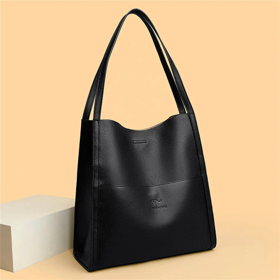 Trendy leren dames schoudertas Mila van echt leer, perfect als ruime dagelijkse handtas en mode accessoire.