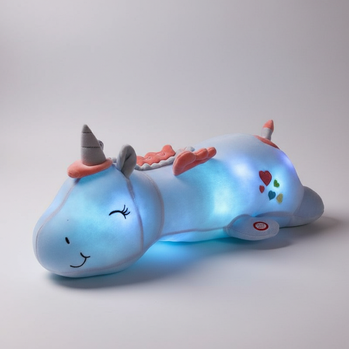 Multifunctioneel pluche kinderkussen Dreamhorn; knuffeldier en zacht nachtlampje voor rustige nachten.