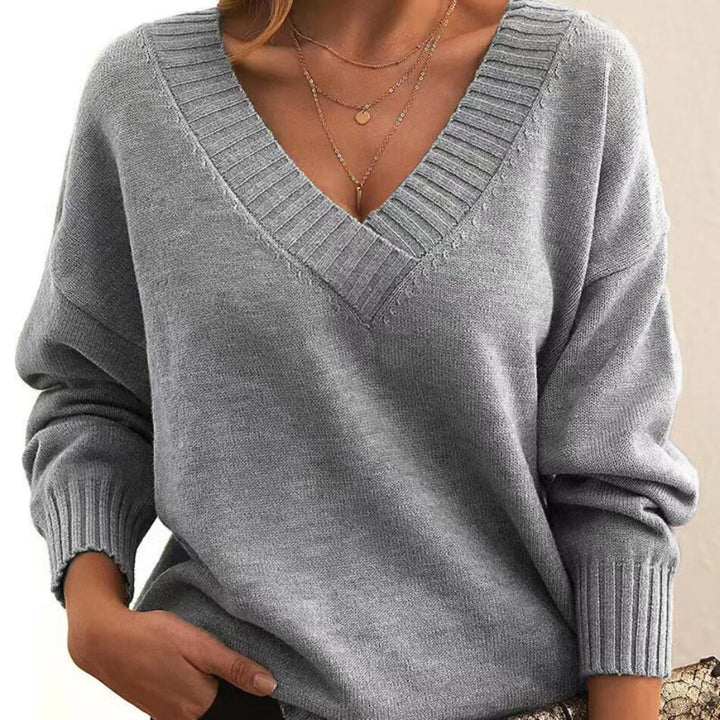 Dames relaxte V-hals trui van zachte stof, ideaal voor comfortabele casual herfst- en wintermode.