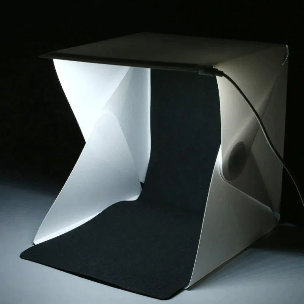 GlowBox mini fotostudio inclusief dimbare LED-verlichting en verwisselbare achtergronden voor creatieve productshoots.