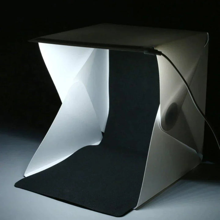 GlowBox mini fotostudio inclusief dimbare LED-verlichting en verwisselbare achtergronden voor creatieve productshoots.