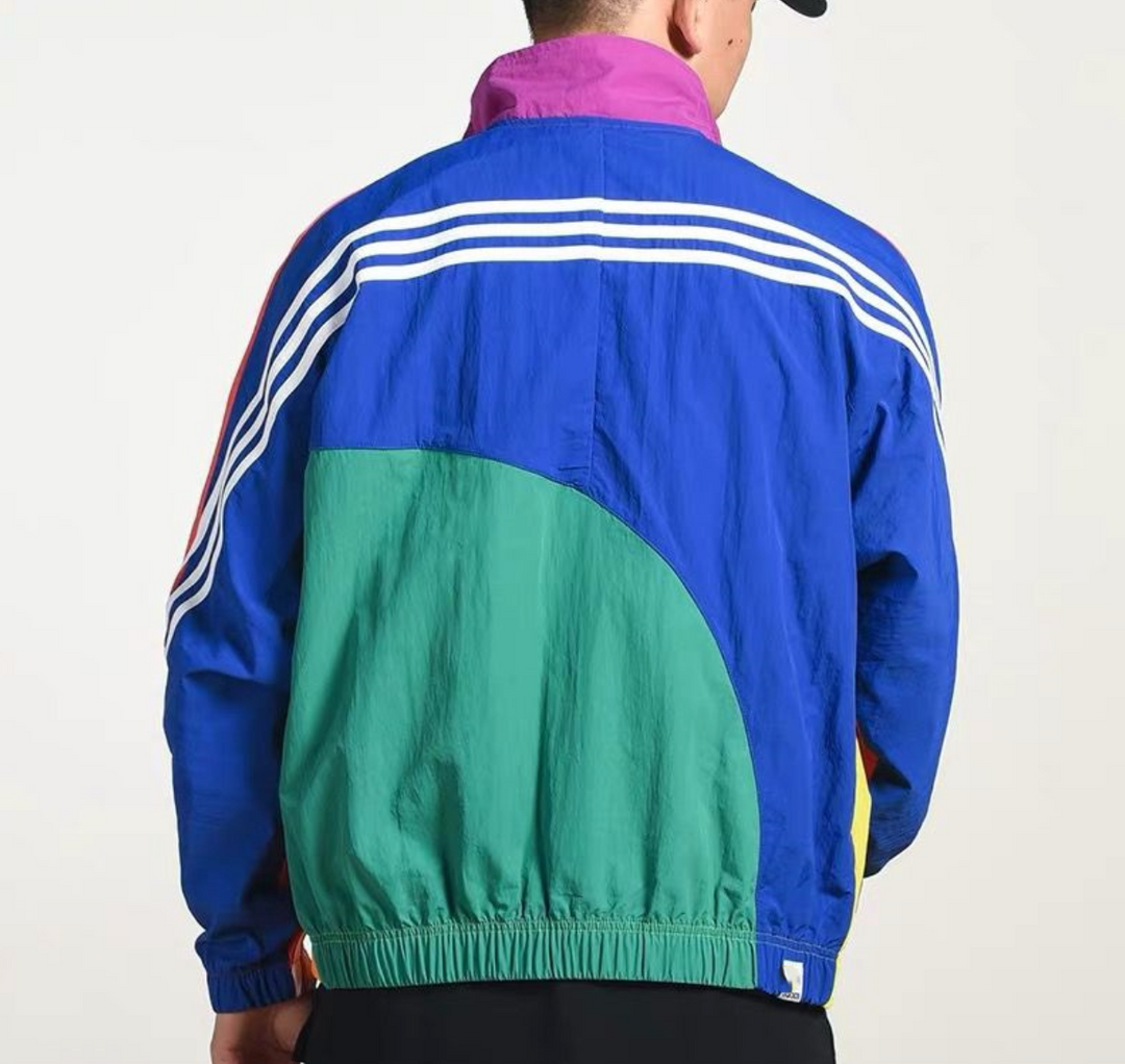 Exclusief unisex regenboog jack uit de '99 Collectie. Limited Edition retro buitenkleding, modieus en comfortabel.