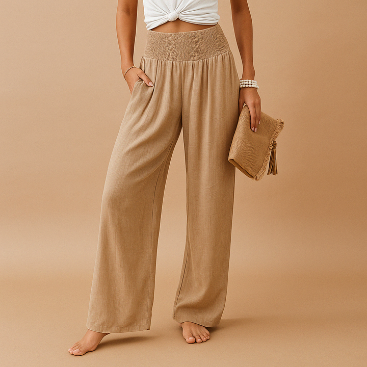 Elegante linnen damesbroek met hoge taille en elastische band, perfect voor een stijlvolle zomerlook.