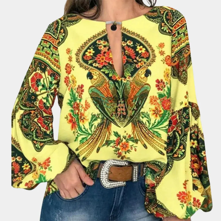 Luchtige Hoymans zomerblouse voor dames, casual en modieus, perfect voor een elegante zomerlook.