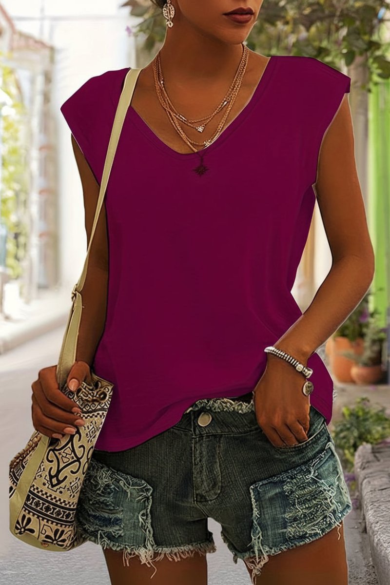 Casual, comfortabel en losvallend dames V-hals T-shirt, perfect als kleurrijke basistop voor de zomer.